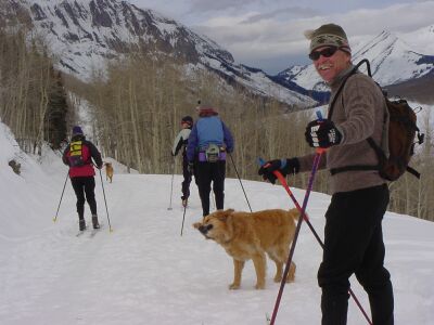 Jerry is very happy to ski downhill.